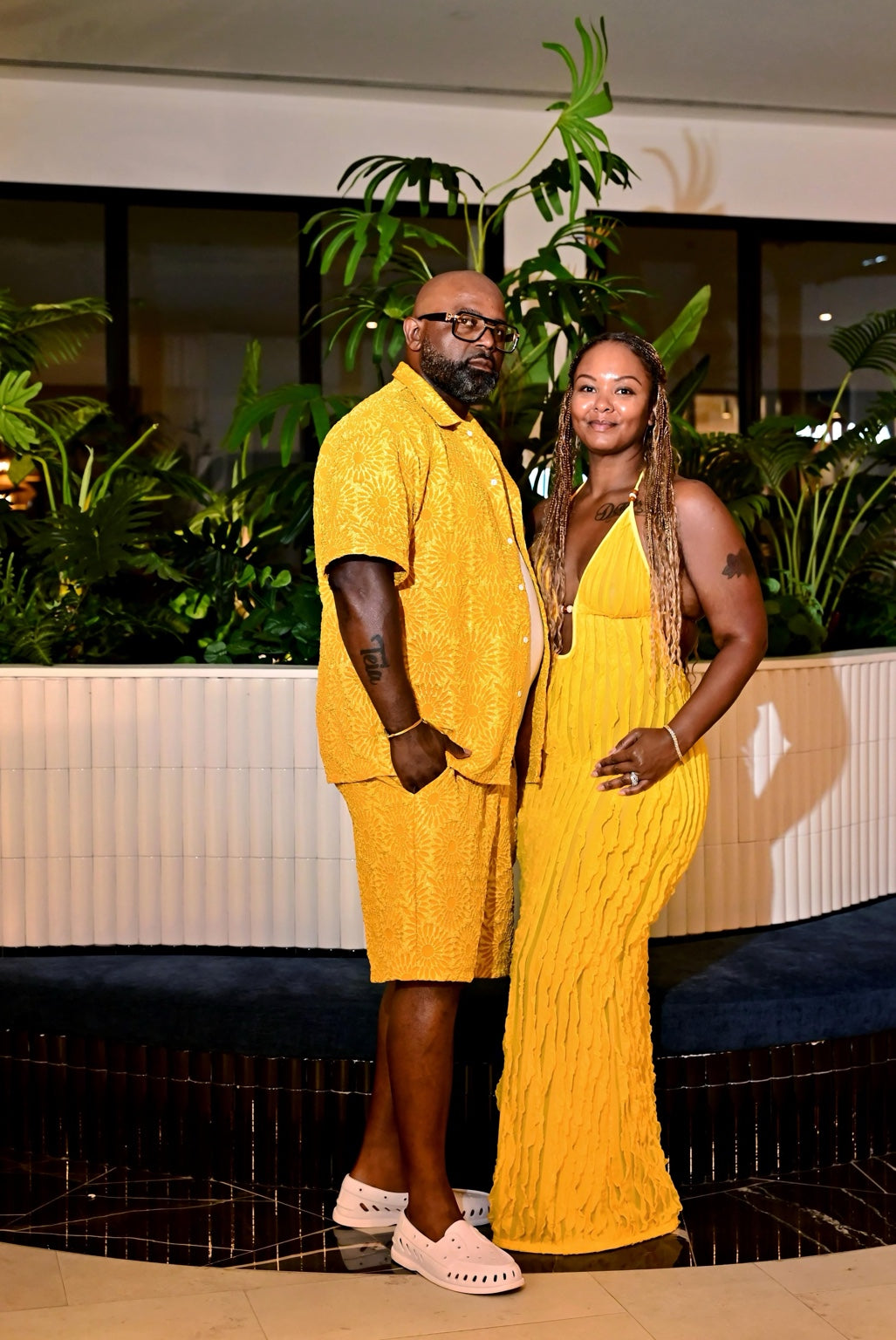 Dennis and Teia together in yellow outfits